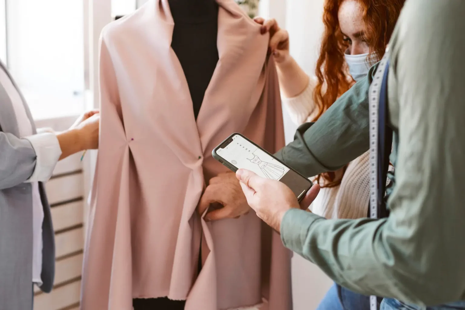 group-fashion-desrs-working-atelier-checking-garment-dress-form 1